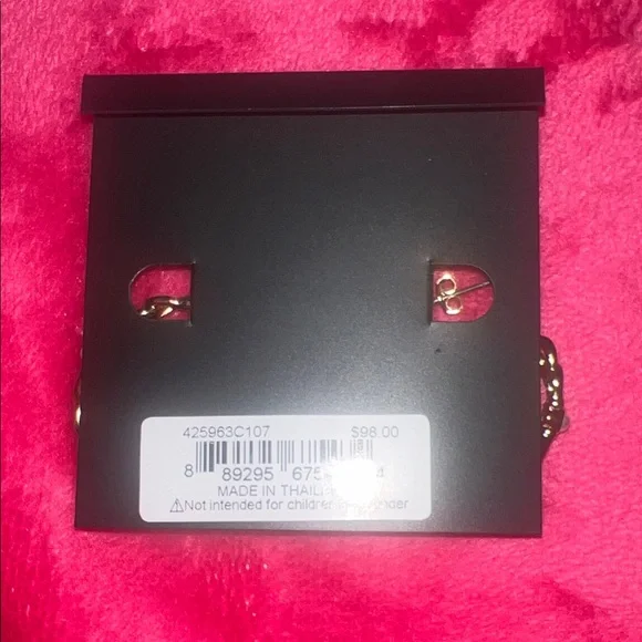 Coach Twisted Gold Hoop Earrings - Picture 5 of 5